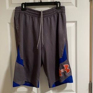 Under Armour- Men’s shorts. Size M loose fit. More like a large